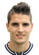Lamela E.
